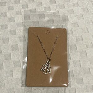 This is a chain necklace with an angel pendant